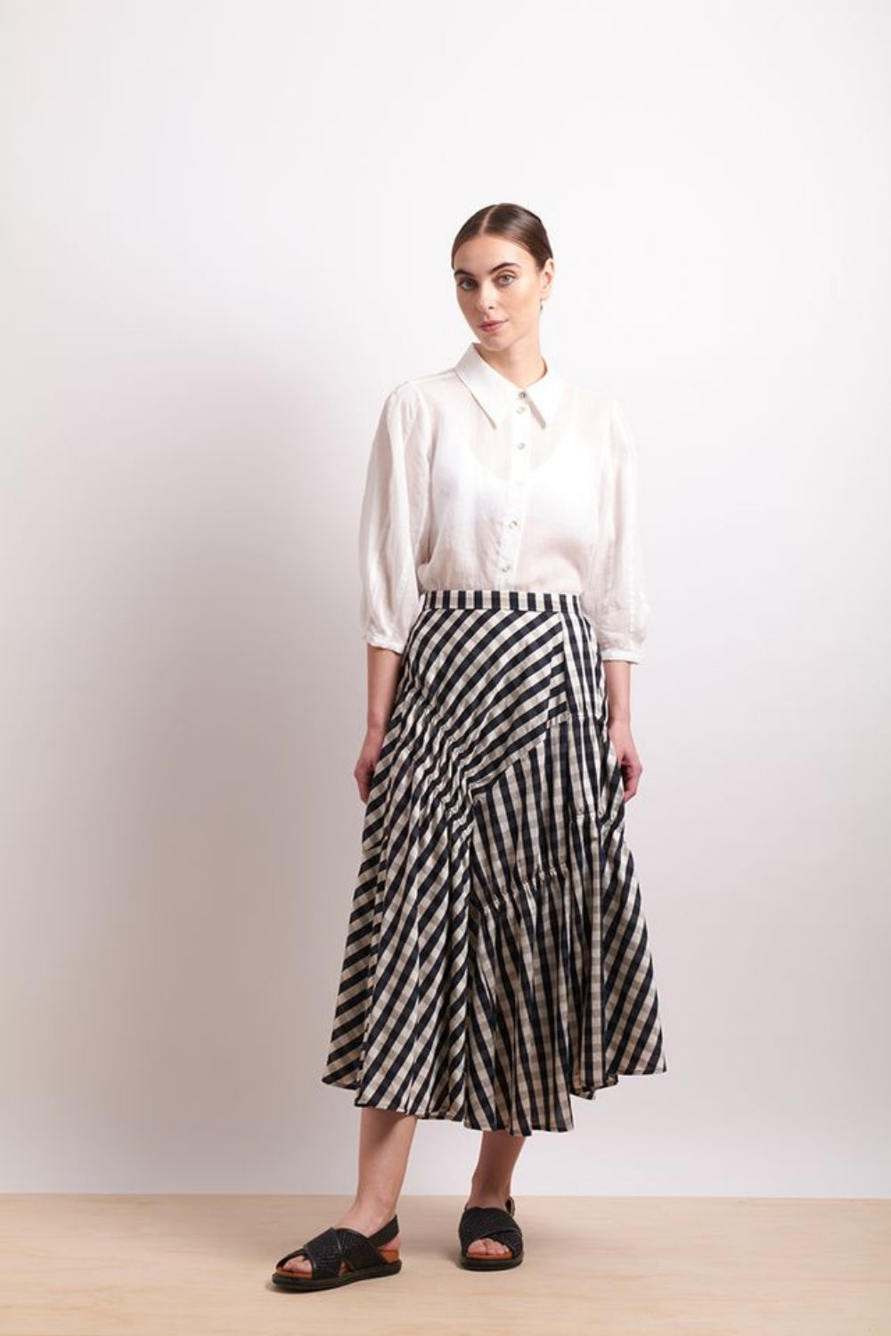 NERIS IN STITICHES SKIRT INK CHECK