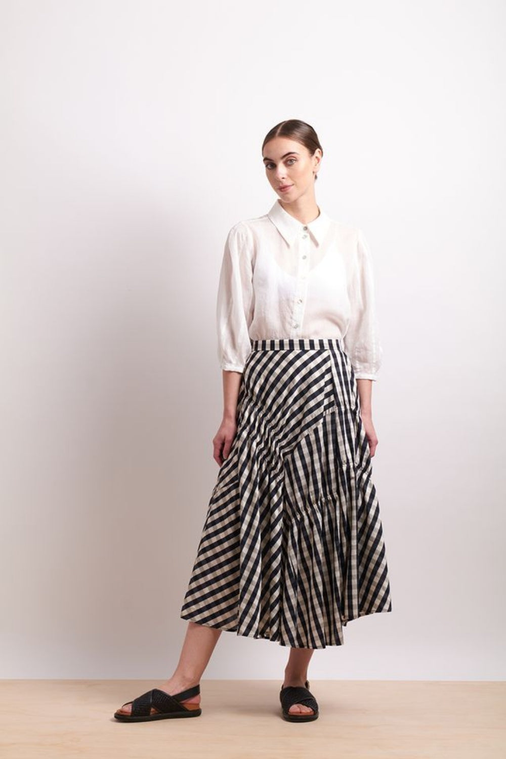 NERIS IN STITICHES SKIRT INK CHECK