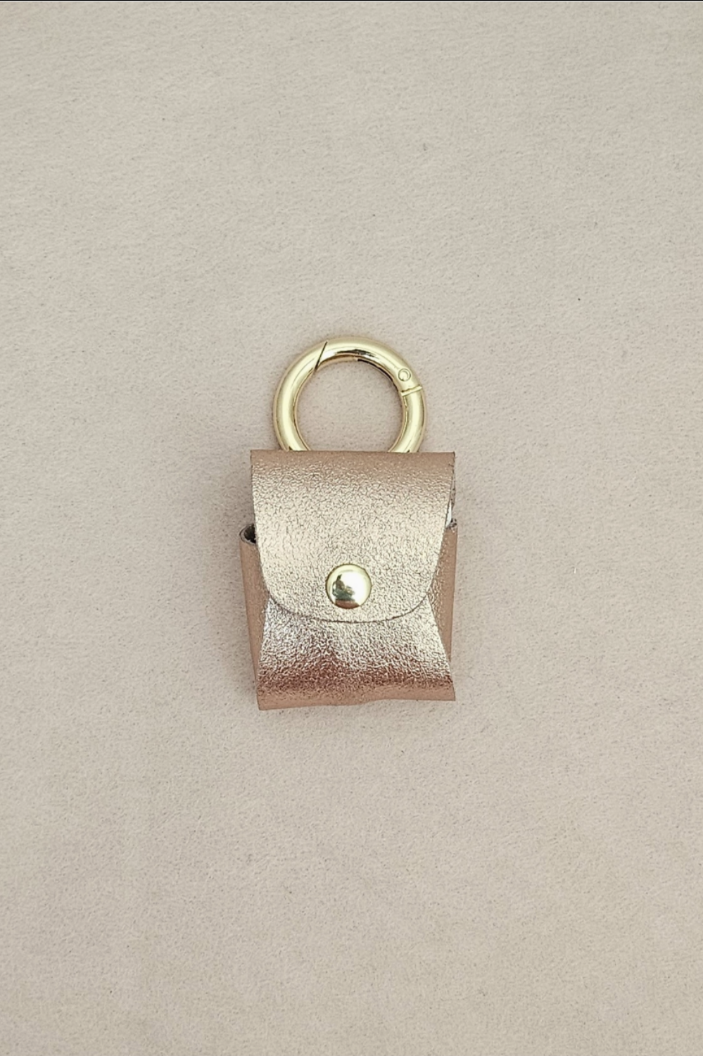 ARIEL AIRPOD CASE ROSE GOLD