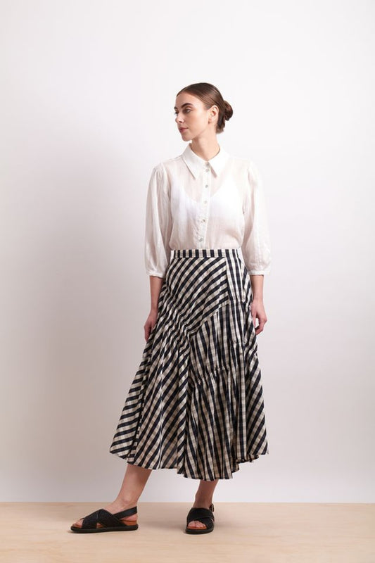 NERIS IN STITICHES SKIRT INK CHECK