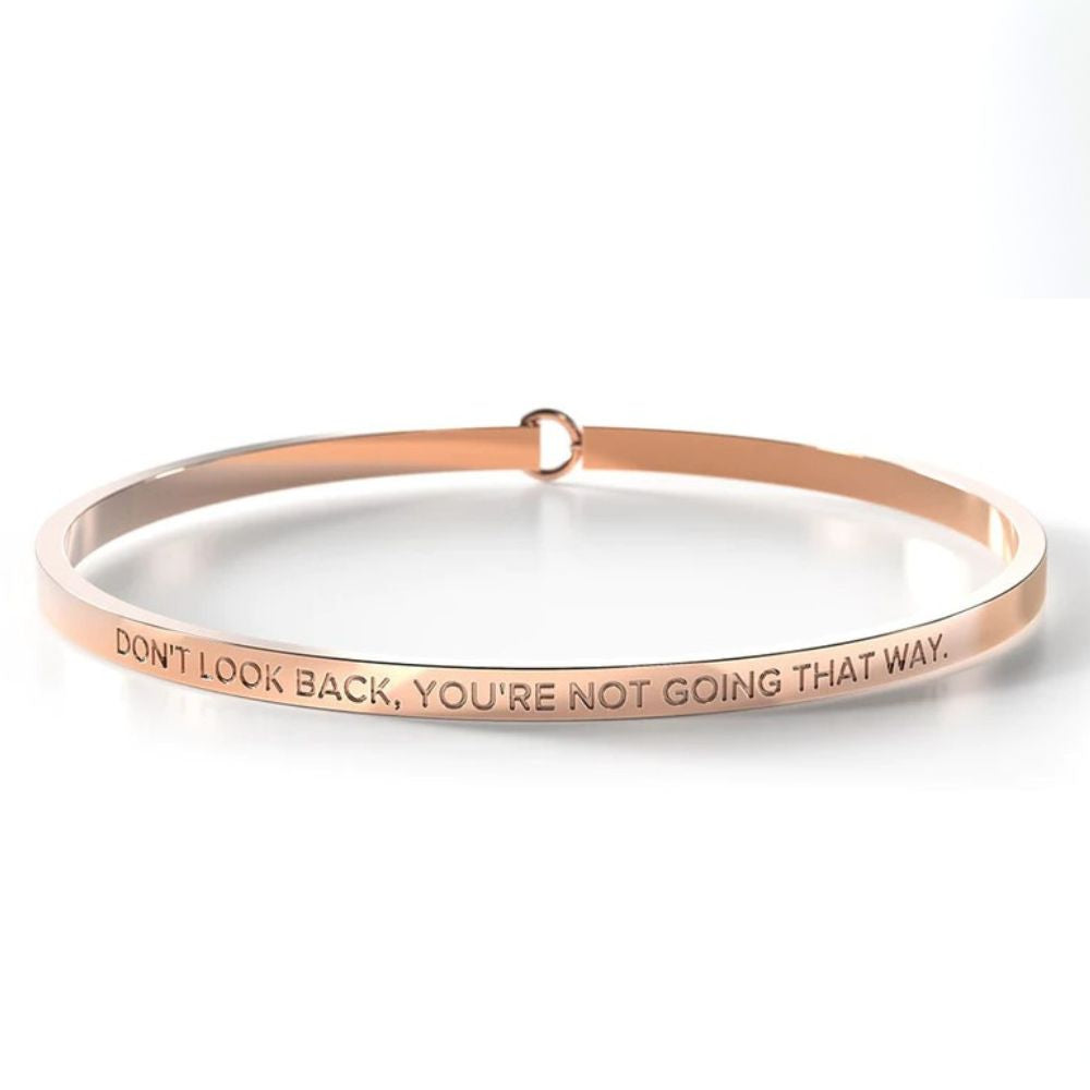 BE. BANGLES DON'T LOOK BACK, YOU'RE NOT GOING THAT WAY BANGLE ROSE GOLD